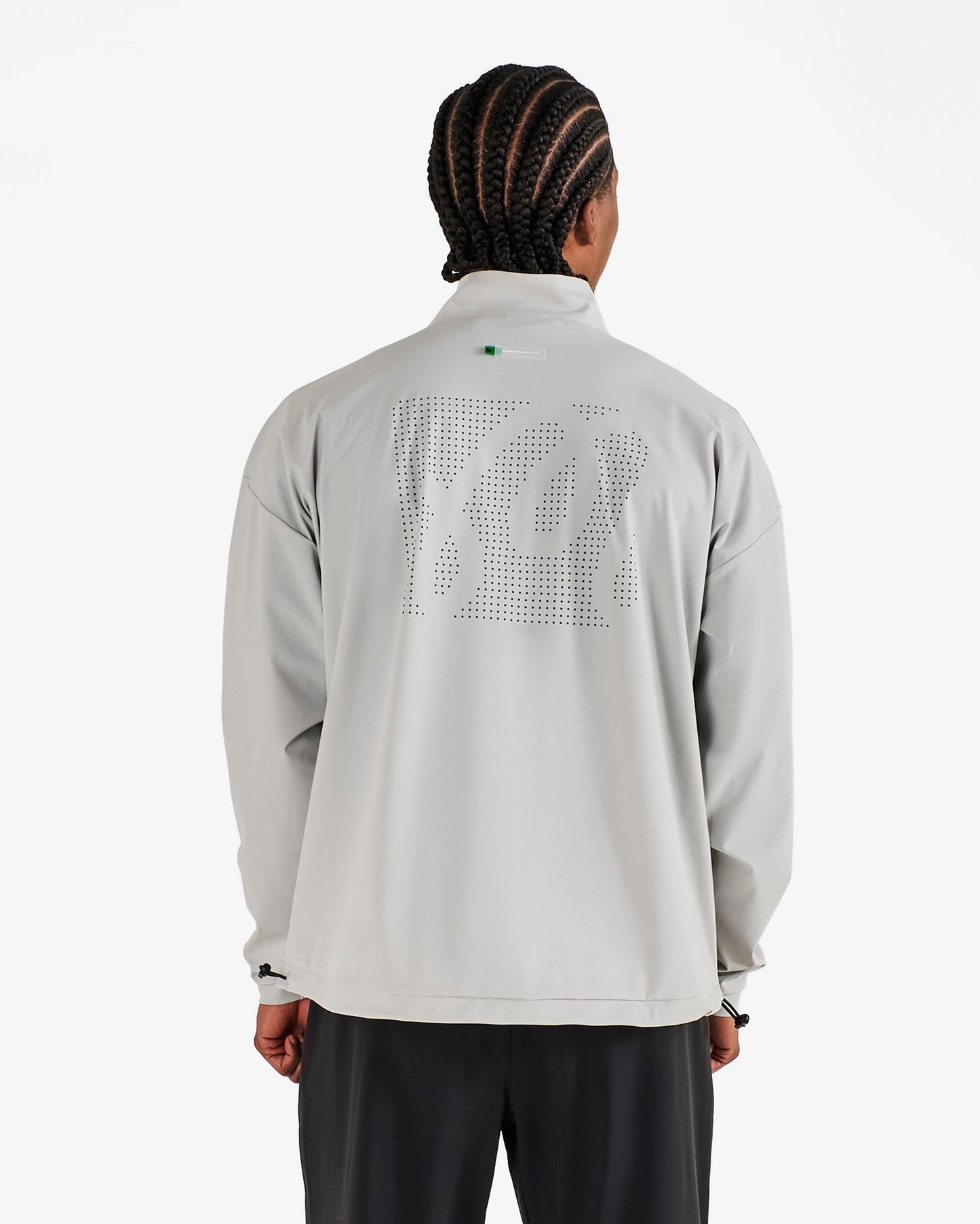 PERFORMANCE QUARTER ZIP SHELL PULLOVER