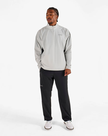 PERFORMANCE QUARTER ZIP SHELL PULLOVER